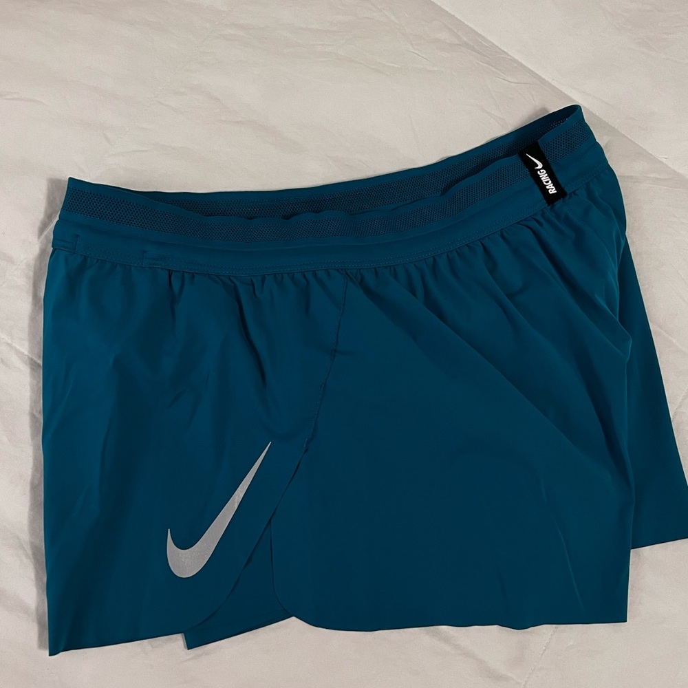 Nike teal blue running shorts